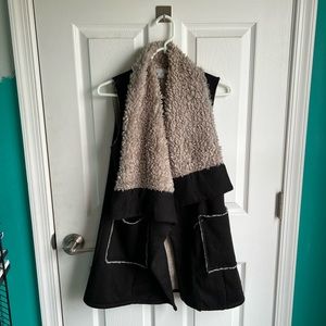 Lightly worn faux fur vest